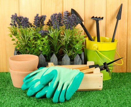 Trained landscapers using protective equipment on site